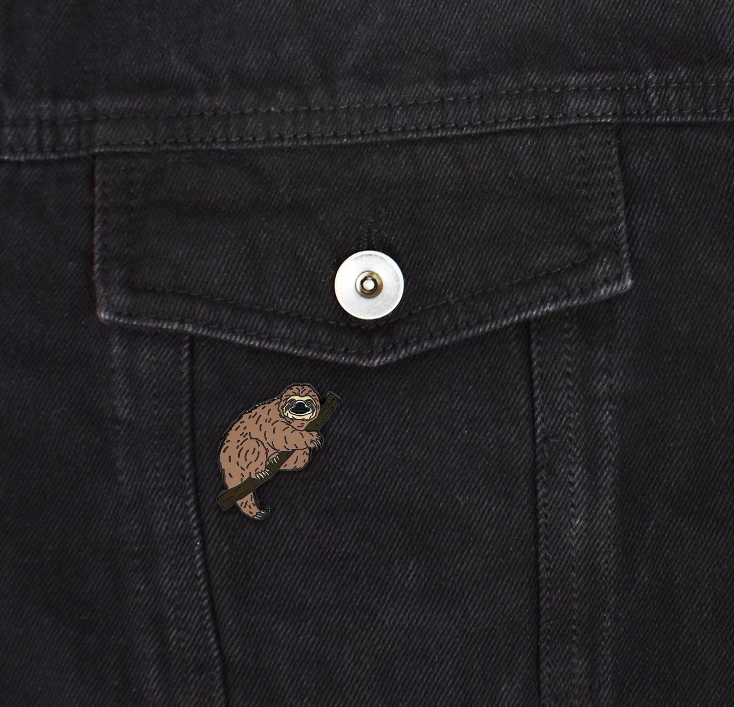 a close up of a button on a pair of jeans