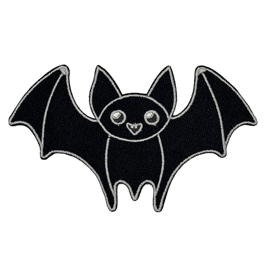 Black bat illustration with a white border on a white background