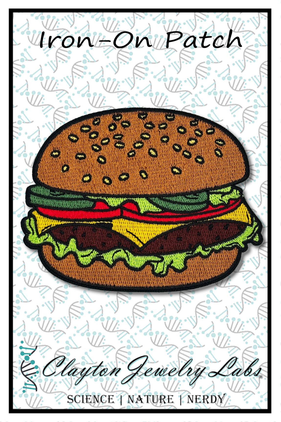 Iron-on patch of a hamburger with 'Clayton Jewelry Labs' branding on a white background.