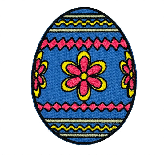 Decorative patch of a blue Easter egg with pink flowers and yellow accents on a white background