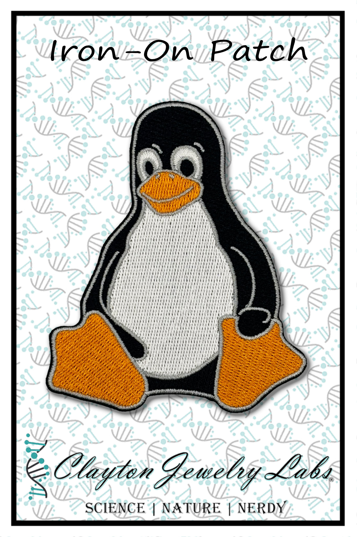 Tux the Linux Penguin iron-on patch with 'Clayton Jewelry Labs' branding on a patterned background
