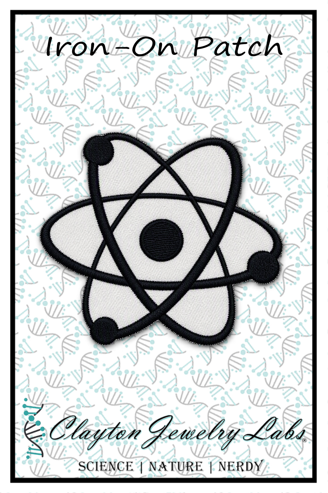 An iron-on patch featuring a black and white embroidered atom design, presented on a branded white backing card with the text 'Iron-On Patch' and 'Clayton Jewelry Labs'.
