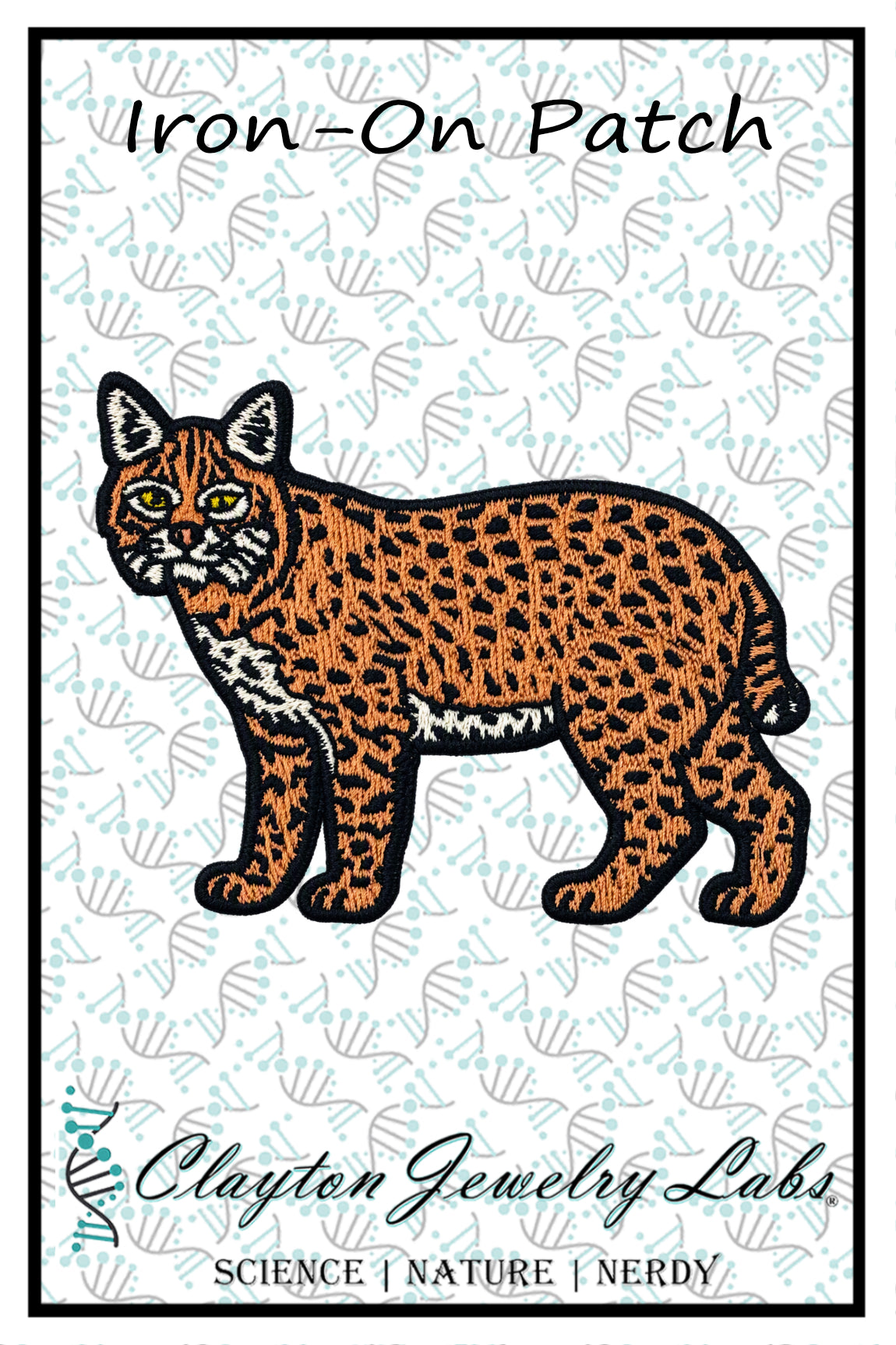 An embroidered iron-on patch design featuring a lynx cat with an orange and black spotted coat, set against a white patterned background with the text 'Iron-On Patch' at the top and 'Clayton Jewelry Labs' at the bottom.