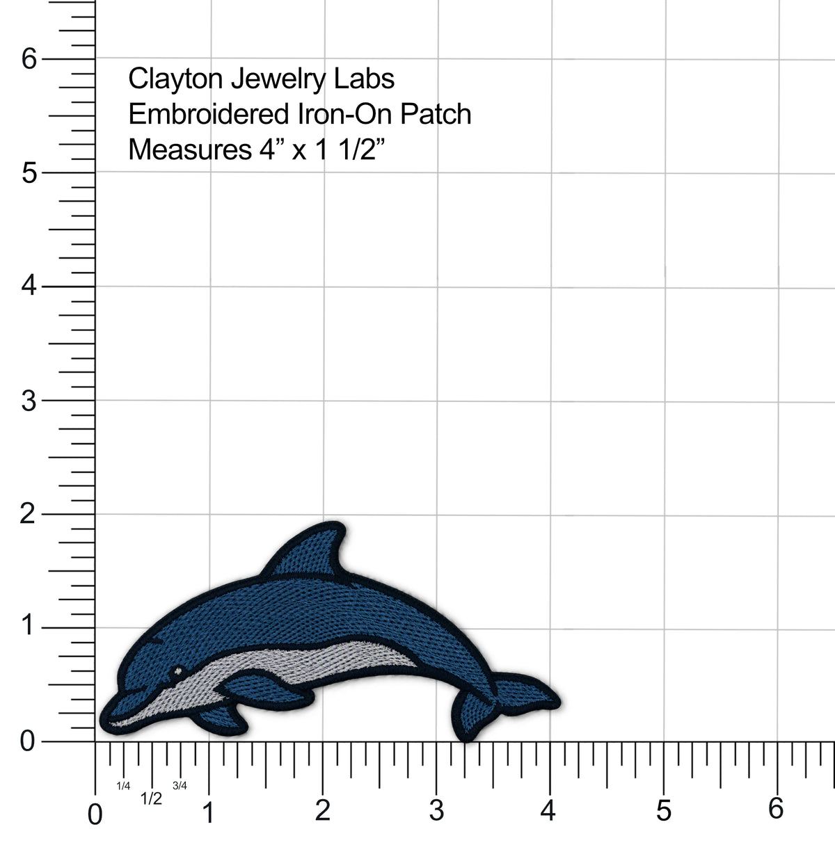 A dolphin-shaped embroidered iron-on patch shown on a white grid background with measurement rulers along the left and bottom edges. Text at the top reads 'Clayton Jewelry Labs Embroidered Iron-On Patch Measures 4" x 1 1/2"'.