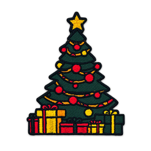 An embroidered Christmas tree patch with a gold star on top, decorated with red and yellow ornaments, and wrapped in gold garlands, with gift boxes at the base on a white background.