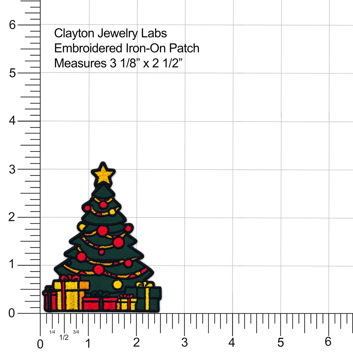 A small embroidered iron-on patch shaped like a Christmas tree with a gold star, red and yellow ornaments, and wrapped presents at the base, shown on a white grid with measurement markings and text reading 'Clayton Jewelry Labs Embroidered Iron-On Patch Measures 3 1/8" x 2 1/2"'.