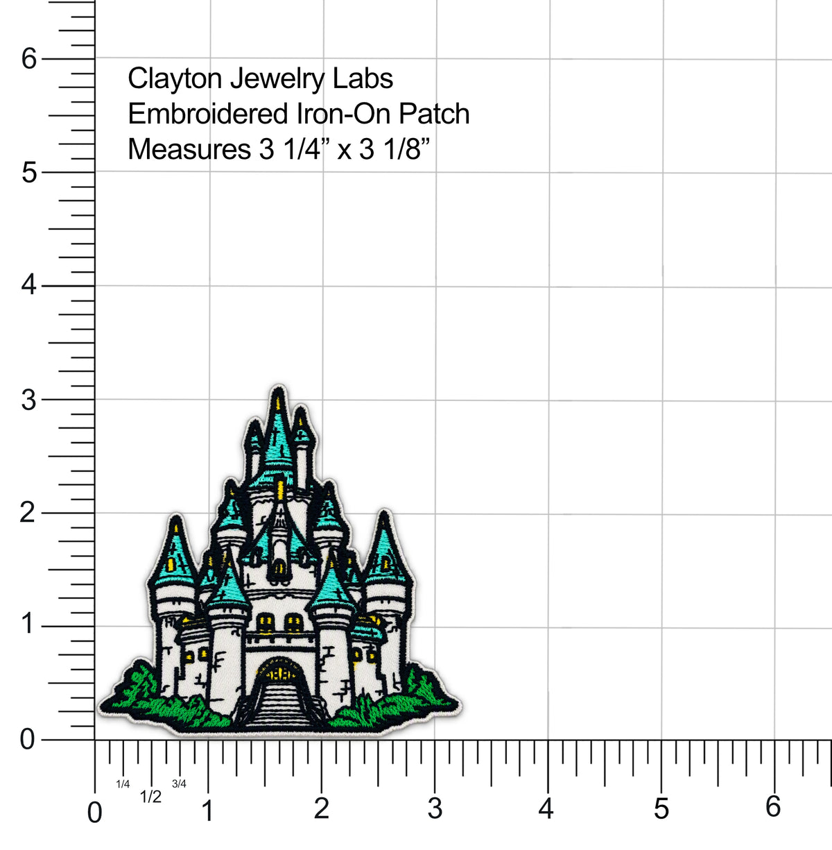An embroidered iron-on patch of a castle with turquoise roofs and green bushes, shown on a white grid background with measurement rulers and text reading 'Clayton Jewelry Labs Embroidered Iron-On Patch Measures 3 1/4" x 3 1/8"'.