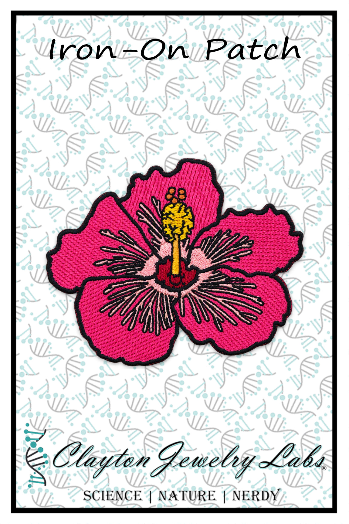 An embroidered iron-on patch featuring a bright pink hibiscus flower with a yellow and red center, outlined in black. The patch is displayed on a white background with a light blue patterned watermark and text reading 'Iron-On Patch' at the top and 'Clayton Jewelry Labs' at the bottom.