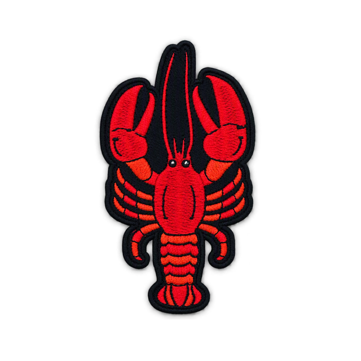 A red embroidered lobster patch with black outlines and details, shown on a plain white background.