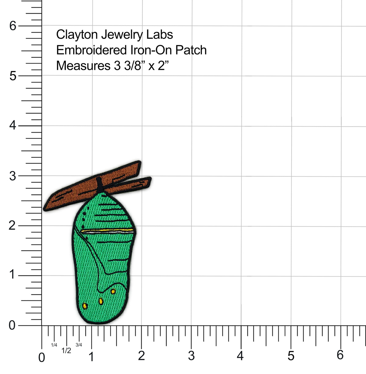 An embroidered iron-on patch of a butterfly wing design by Clayton Jewelry Labs, shown on a white background with measurement rulers and text indicating dimensions of 3 3/8" x 2".