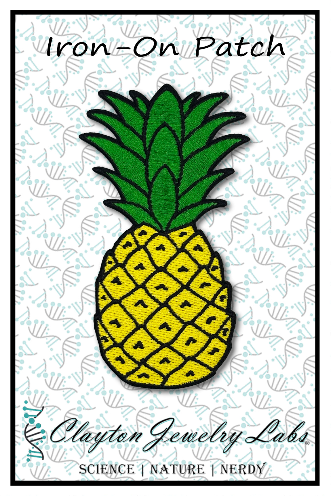 Pineapple-shaped iron-on patch with green leaves and yellow body on a white background, branded by Clayton Jewelry Labs.