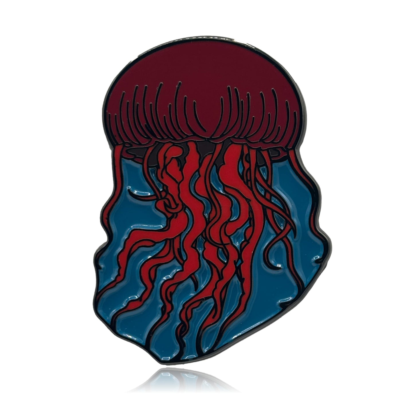 red jellyfish-shaped pin on a white background