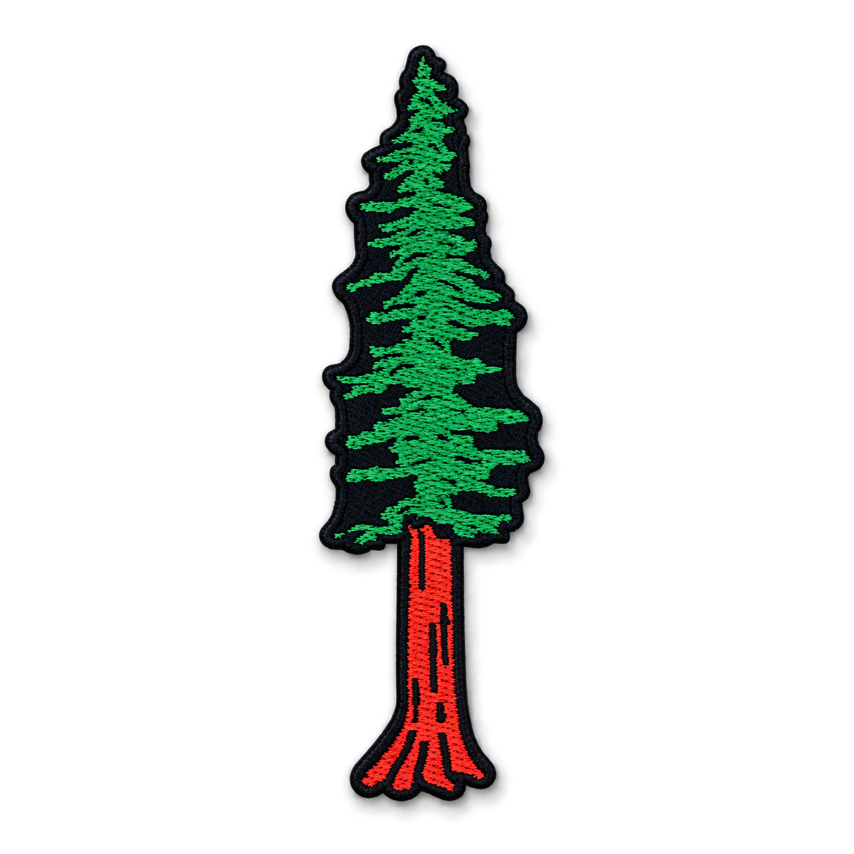 An embroidered pine tree patch with a green needle-covered canopy, a red trunk, and a black embroidered border on a white background.