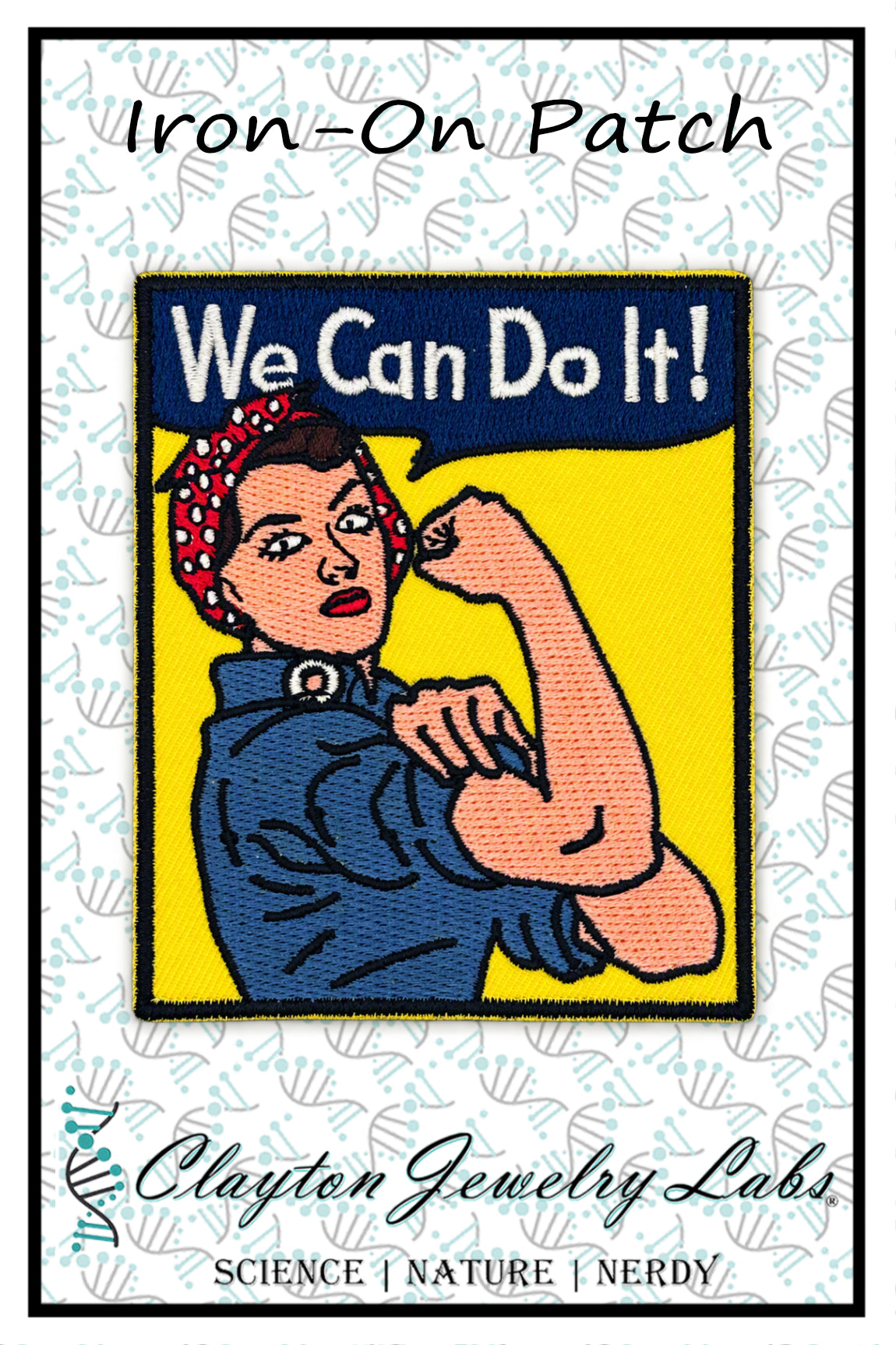 An embroidered iron-on patch featuring the 'We Can Do It!' Rosie the Riveter design, with a white patterned border and the text 'Iron-On Patch' at the top and 'Clayton Jewelry Labs' at the bottom.