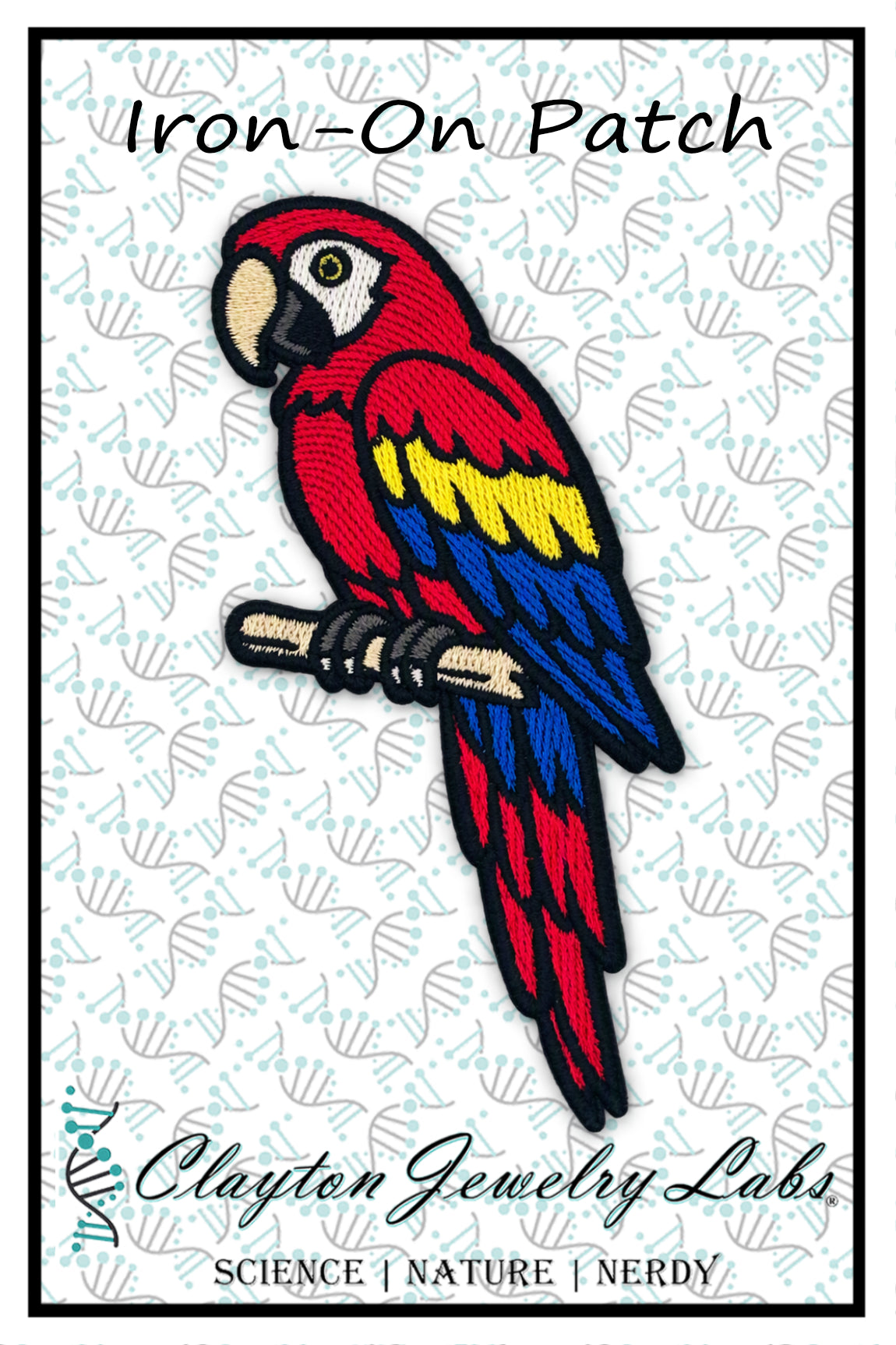An embroidered iron-on patch featuring a red, yellow, and blue parrot perched on a branch, shown on a white patterned background with the text 'Iron-On Patch' at the top and 'Clayton Jewelry Labs' at the bottom.