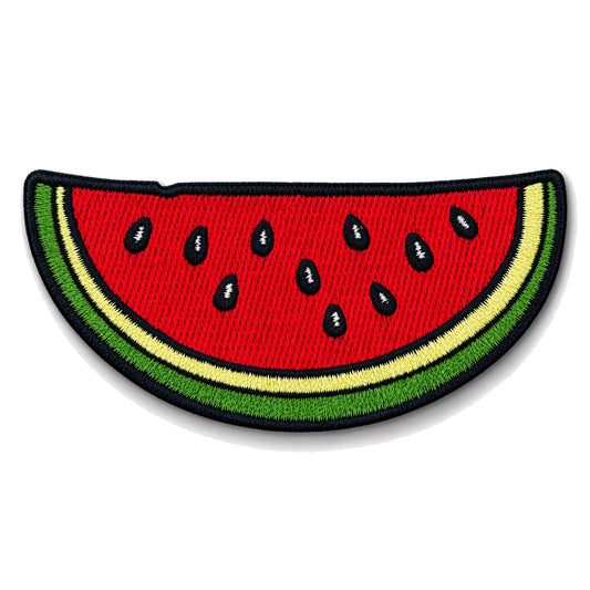 An embroidered watermelon slice patch with red flesh, black seeds, and green and yellow rind, shown on a plain white background.